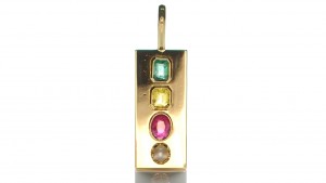 Green And Yellow Sapphire With Ruby And A White Pear
