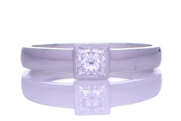 Square Diamond Placed On A Silver Ring