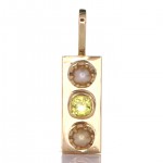 Yellow Sapphire With Two White Pearls Placed On A Gold Pendant