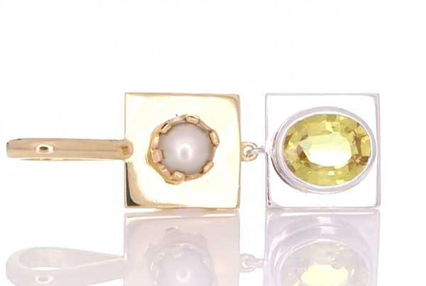 White Pearl Placed on A Golden Pendant Attached With A Yellow Sapphire Placed On A Silver Pendant
