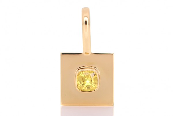 Golden Sapphire Placed In A Golden Pendant