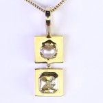 Golden Sapphire With White Pearl On A Golden Pendant