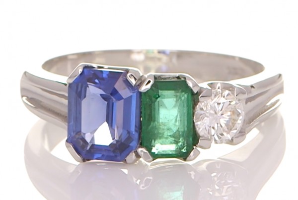 Green Emerald, Blue Sapphire And A Diamond On A Silver Ring