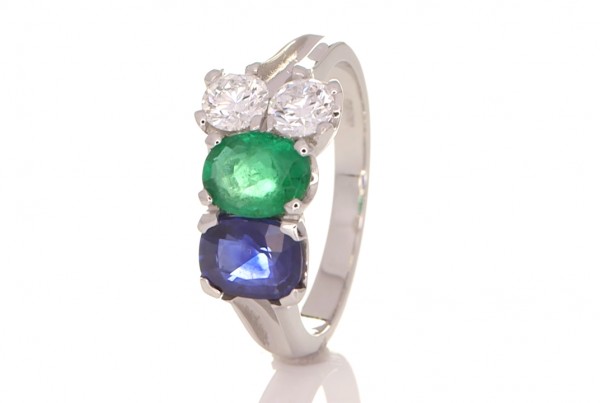 Green Emerald, Blue Sapphire And Two Diamonds On A Silver Ring