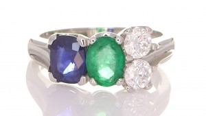Green Emerald, Blue Sapphire And Two Diamonds On A Silver Ring