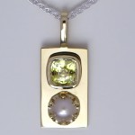 Yellow Sapphire With A White Pearl Mounted On A Golden Pendant