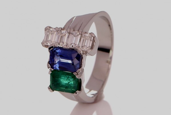 Four Diamonds With Green Emerald And A Blue Sapphire 