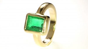Green Emerald in A Golden Ring