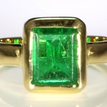 Green Emerald in A Golden Ring