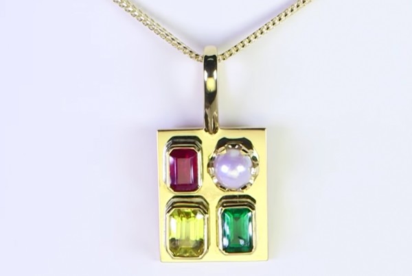Ruby, Yellow Sapphire, Green Emerald And A White Pearl Mounted On A Golden Pendant