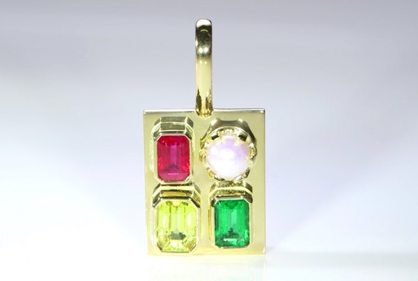 Ruby, Yellow Sapphire, Green Emerald And A White Pearl Mounted On A Golden Pendant