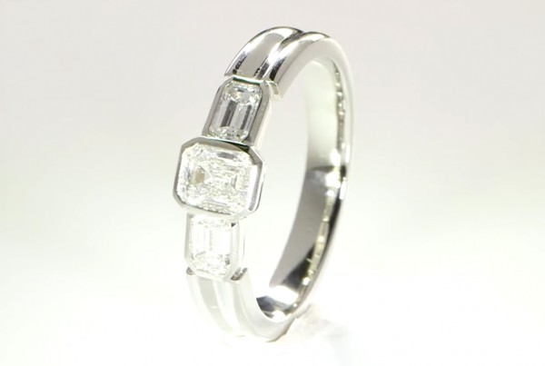 Three Diamonds Mounted In a Platinum Ring