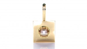 White Pearl Mounted On A Golden Pendant