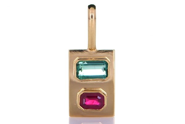 Green Emerald With Ruby Mounted Onto A Golden Pendant