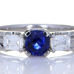 Platinum Ring With Two Diamonds And A Blue Sapphire