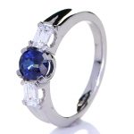 Platinum Ring With Two Diamonds And A Blue Sapphire