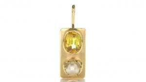 Golden Pendant With Golden Sapphire And A White Pearl