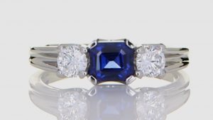 Platinum Ring With Two Diamonds And Blue Sapphire