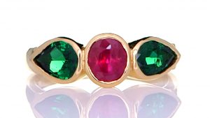 Golden Ring With Two Emeralds And A Ruby