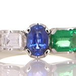 Platinum Ring With A Diamond, Emerald And A Blue Sapphire