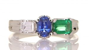 Platinum Ring With A Diamond, Emerald And A Blue Sapphire