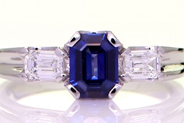 Octogaon Blue Sapphire And 2 Emerald Cut Diamonds, Set in Platinium Ring
